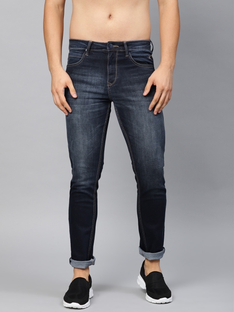 

HRX by Hrithik Roshan Men Blue Slim Fit Mid-Rise Clean Look Stretchable Jeans