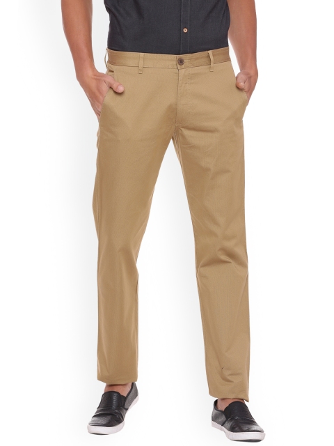 

Van Heusen Sport Men Beige Slim Fit Solid Regular Trousers