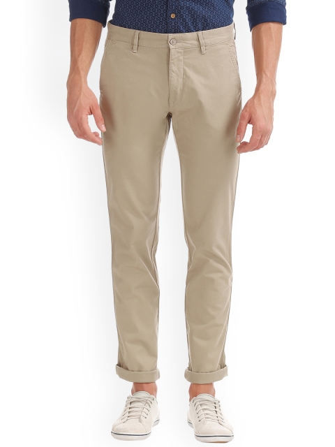 

IZOD Men Beige Slim Fit Solid Chinos