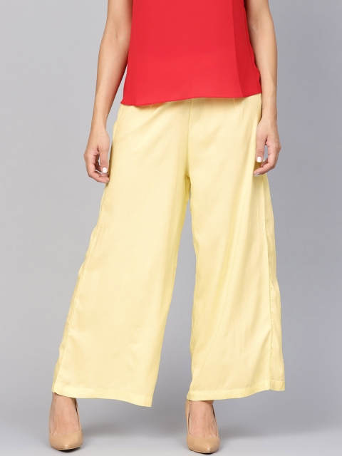 

Shree Women Yellow Solid Wide Leg Palazzos