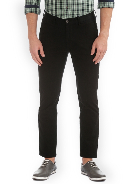 

Arrow Sport Men Black Slim Fit Solid Chinos