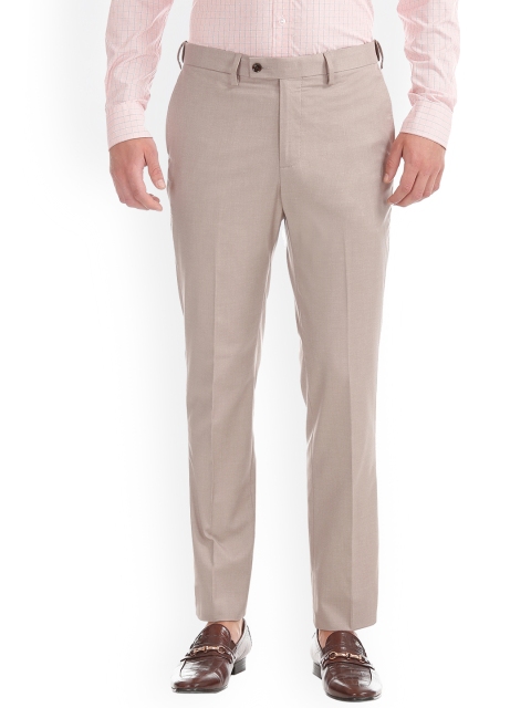 

Arrow Men Beige Tapered Fit Solid Formal Trousers