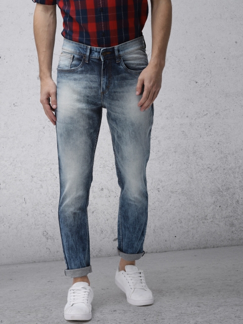 

Ecko Unltd Men Blue Tapered Fit Mid-Rise Clean Look Stretchable Jeans