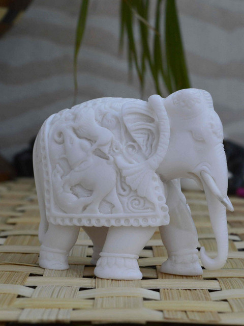 

eCraftIndia White Handcrafted Elephant Statue