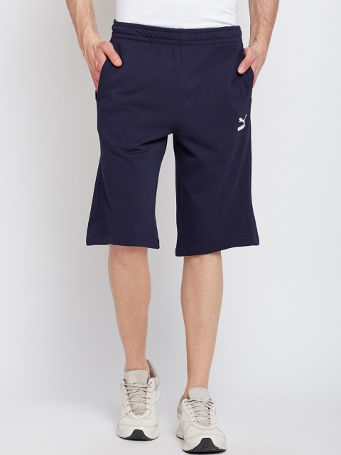 

Puma Men Navy Blue Solid Regular Fit Regular Shorts