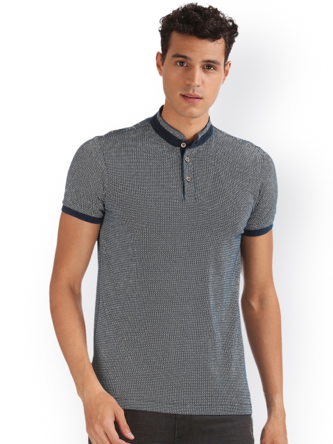 

Arrow Sport Men Blue Self Design Mandarin Collar T-shirt