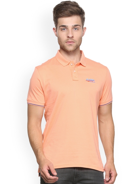 

Peter England Men Orange Solid Polo Collar T-shirt