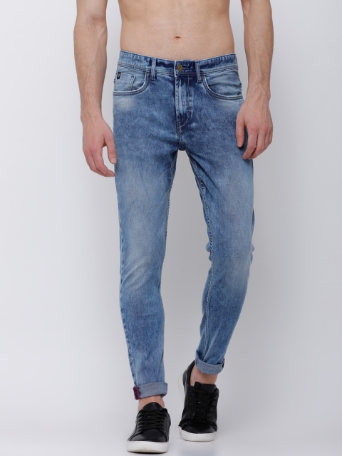 

LOCOMOTIVE Men Blue Tapered Fit Mid-Rise Clean Look Stretchable Jeans