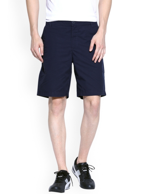 

Puma Men Navy Blue Solid Regular Fit Sports Shorts