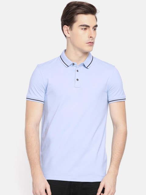 

Calvin Klein Jeans Men Blue Solid Round Neck T-shirt