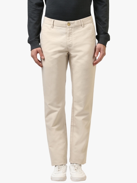 

Raymond Men Beige Slim Fit Solid Regular Trousers