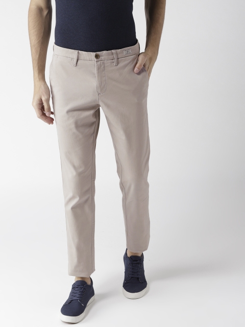 

Tommy Hilfiger Men Beige Solid Denton Straight Fit Chinos