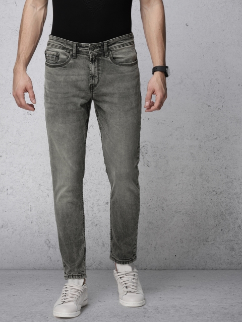 

Ecko Unltd Men Grey Slim Tapered Fit Mid-Rise Clean Look Stretchable Jeans