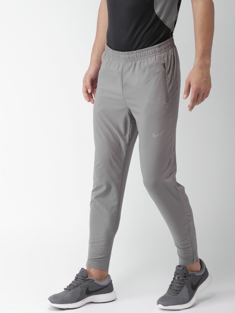 

Nike Men Grey AS M NK ESSNTL WOVEN Running Track Pants