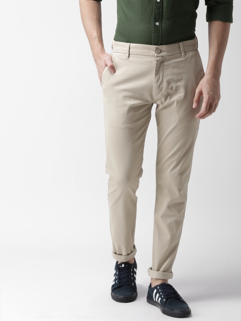 

Levis Men Beige Tapered Fit Solid Chinos 512