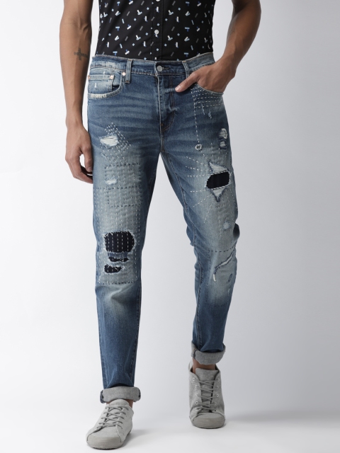 

Levis Men Blue Slim Tapered Fit Low-Rise Mildly Distress Stretchable Jeans 512