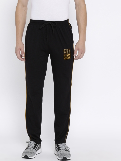 

Duke Men Black Solid Track Pants