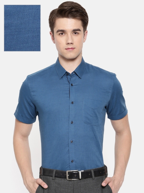 

Peter England Men Blue Slim Fit Solid Formal Shirt