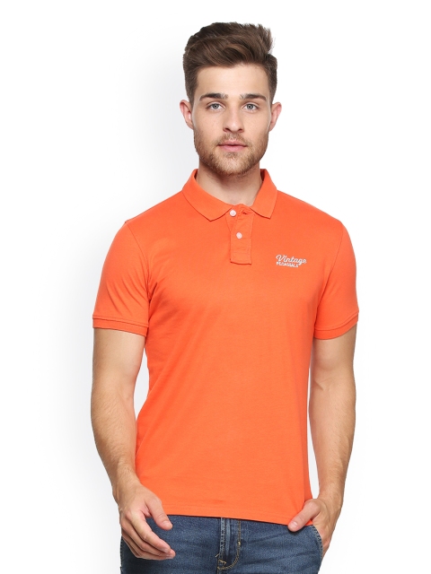 

Peter England Casuals Men Orange Solid Polo Collar T-shirt