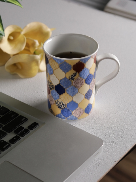 

CLAY CRAFT White & Blue 4-Pieces Printed Bone China Cups Set