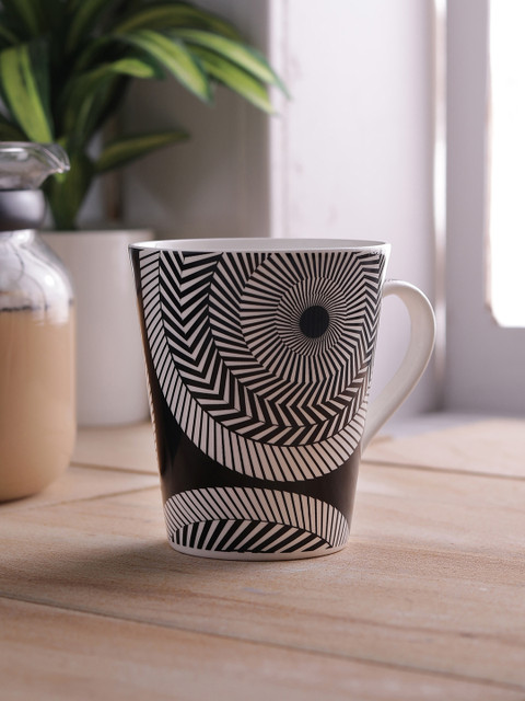 

CLAY CRAFT White & Black 4-Pieces Printed Bone China Cups Set