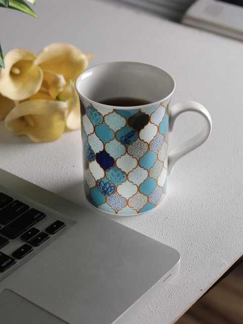 

CLAY CRAFT White & Blue 4-Pieces Printed Bone China Cups Set