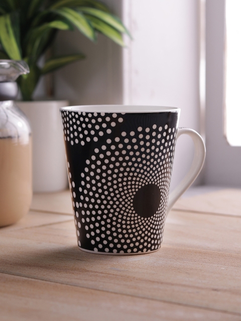 

CLAY CRAFT White & Black 4-Pieces Printed Bone China Cups Set