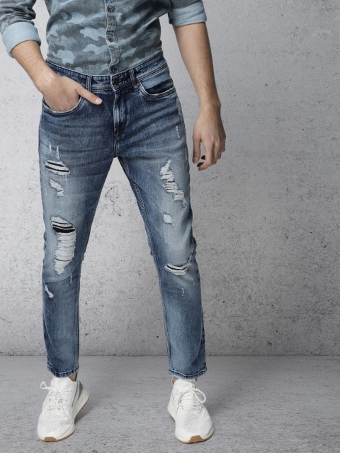 

Ecko Unltd Men Blue Tapered Fit Mid-Rise Highly Distressed Stretchable Jeans