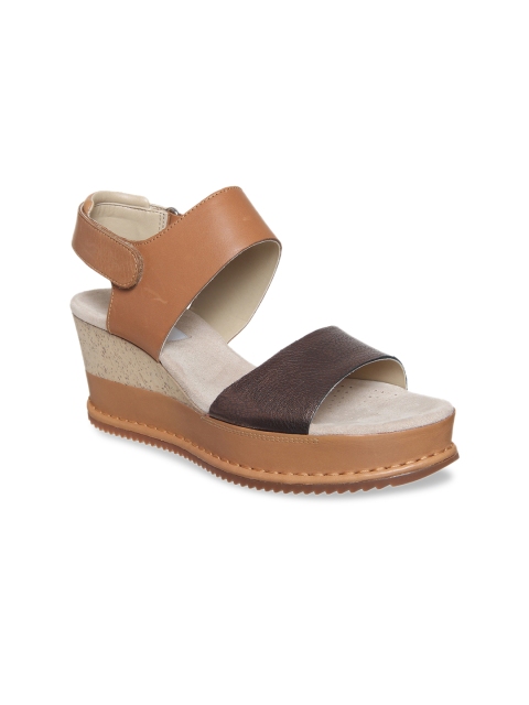 

Clarks Women Tan Colourblocked Leather Wedges