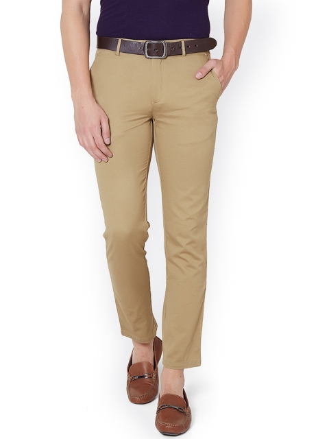 

Peter England Men Beige Slim Fit Solid Regular Trousers