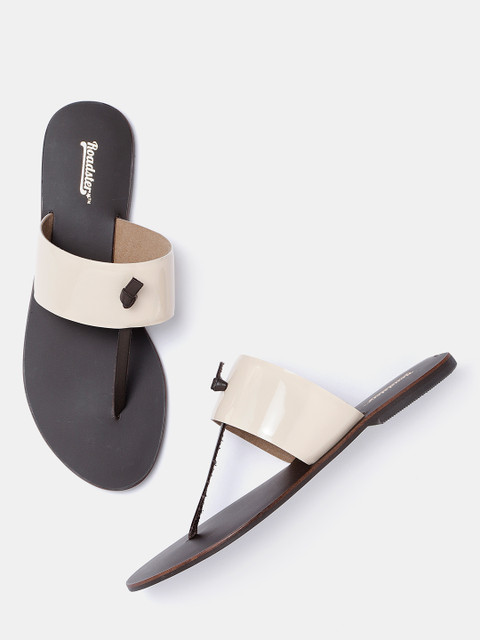 

Roadster Women Beige Solid T-Strap Flats