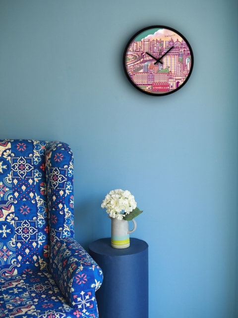 

Chumbak Purple Round Printed 34.5 cm Analogue Wall Clock
