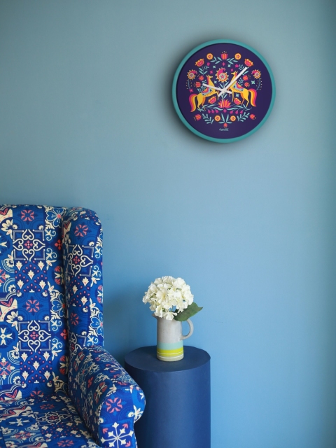

Chumbak Blue Round Printed 34.5 cm Analogue Wall Clock