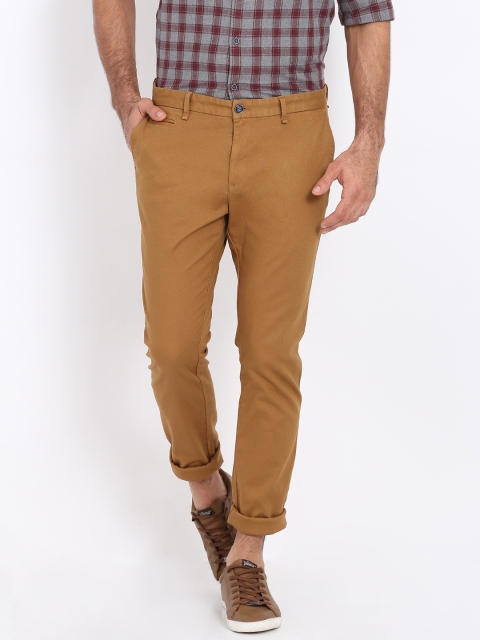 

Indian Terrain Men Brown Slim Fit Self Design Regular Trousers