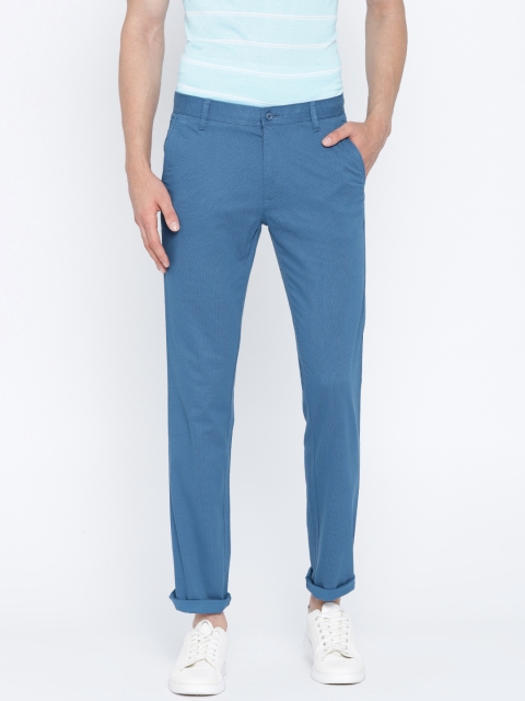 

Monte Carlo Men Blue Solid Regular Fit Trousers