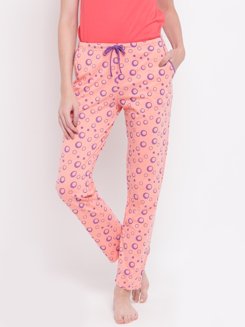 

Kanvin Women Peach-Coloured & Purple Printed Pyjamas MJKSS161E