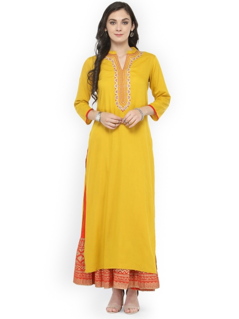 

Varanga Women Yellow Embroidered Kurta with Skirt
