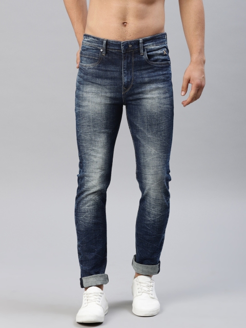 

HRX by Hrithik Roshan Men Blue Slim Fit Mid-Rise Clean Look Stretchable Jeans