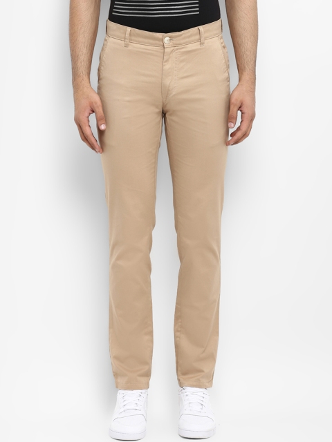 

Raymond Men Beige Slim Fit Solid Chinos
