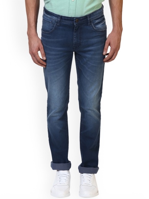 

ColorPlus Men Blue Tapered Fit Mid-Rise Clean Look Stretchable Jeans