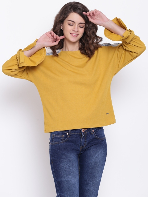 

Elle Women Mustard Solid Round Neck T-shirt