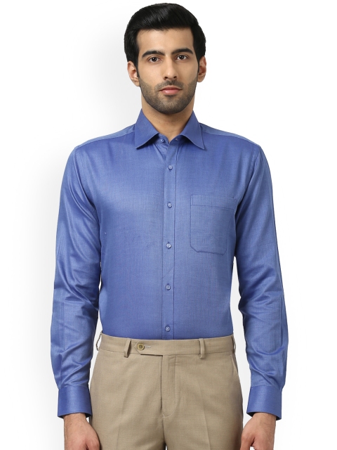 

Raymond Men Blue Regular Fit Solid Formal Shirt