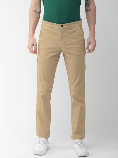 

Park Avenue Men Beige Self Design Regular Trousers