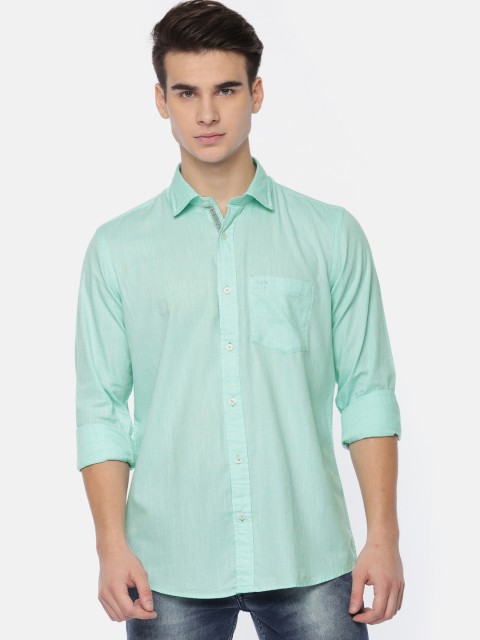 

ColorPlus Men Turquoise Blue Tailored Fit Solid Casual Shirt