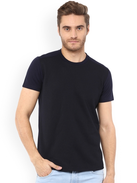 

Mufti Men Navy Blue Self Design Round Neck T-shirt