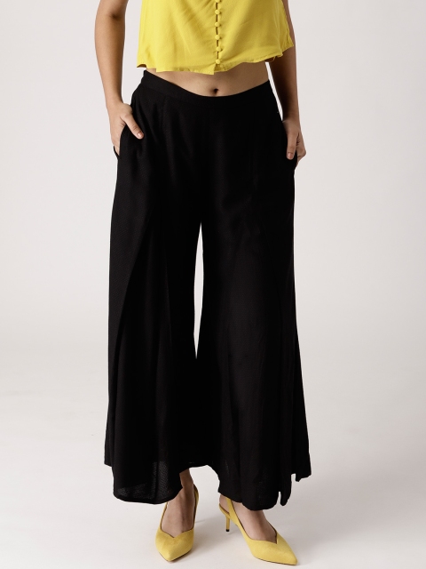 

Libas Women Black Self Design Flared Palazzos