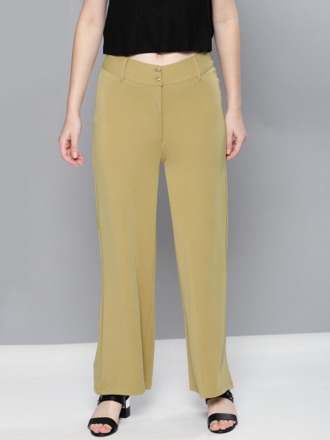 

NUSH Women Beige Loose Fit Solid Bootcut Trousers