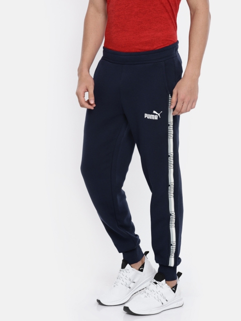 

Puma Men Navy Blue ELEVATED ESS Tape T7 Joggers