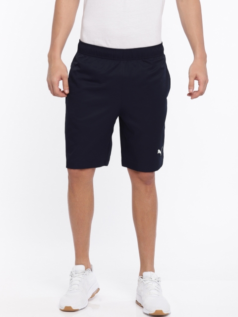 

Puma Men Navy Blue Solid Regular Fit ESS Active Woven DRY-CELL Sports Shorts