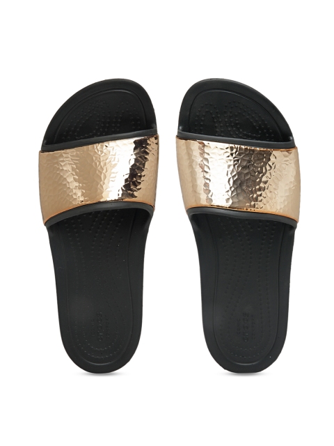 

Crocs Women Black & Gold-Toned Solid Sliders